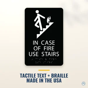 In Case of Fire Use Stairs Sign - ADA Braille, 6" x 9" — black — hero